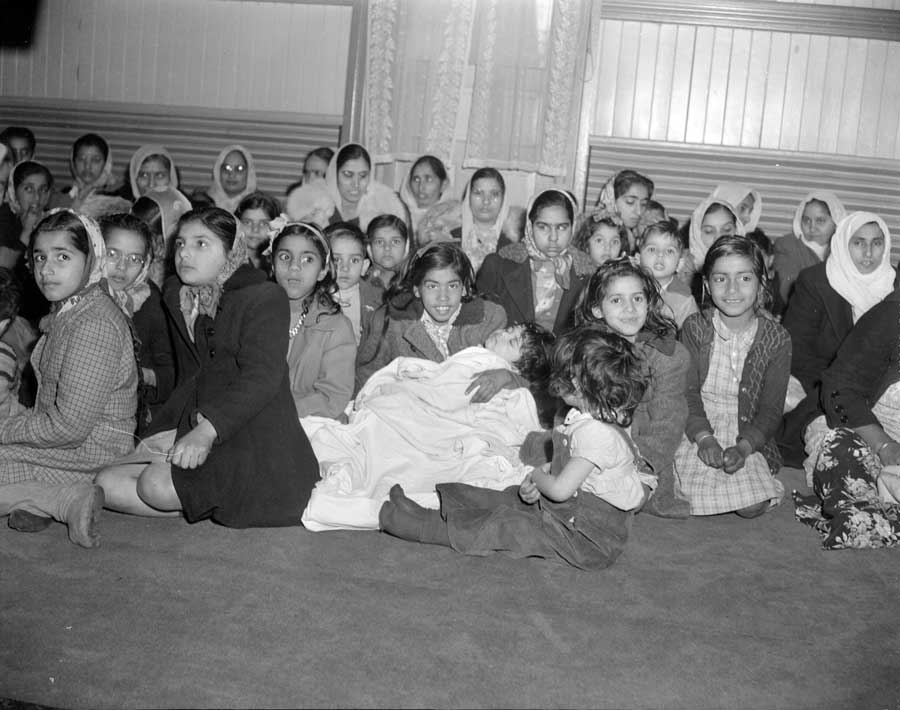 Women and children inside the Khalsa Diwan